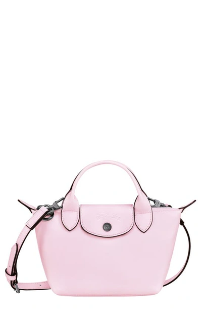 Shop Longchamp Extra Small Le Pliage Leather Top Handle Bag In Petal Pink