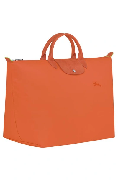 Shop Longchamp Large Le Pliage Recycled Travel Bag In Carrot