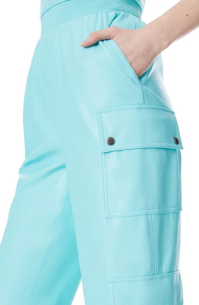 Shop Alice And Olivia Frida Faux Leather Bustier Cargo Jumpsuit In Aqua Blue