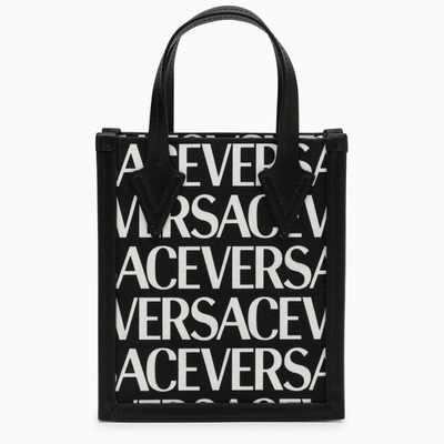 Shop Versace Allover Cross-body Bag In Black
