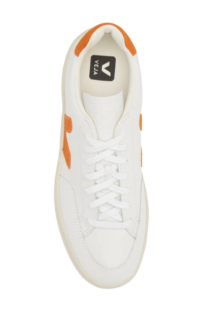 Shop Veja V-12 Low Top Sneaker In Extra-white Pumpkin