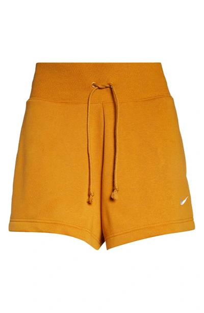 Shop Nike Phoenix Fleece Knit Shorts In Desert Ochre/ Sail