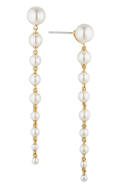 Shop Nadri Dot Dot Dot Imitation Pearl Linear Drop Earrings In Gold With Pearl