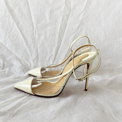 Pre-owned Christian Louboutin Nosy 100 Patent-leather And Pvc T-bar Pumps, 38.5 In Used / 38.5 / White