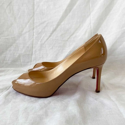 Pre-owned Christian Louboutin Nude Patent Leather Peep Toe Pumps, 37.5 In Used / 37.5 / Nude