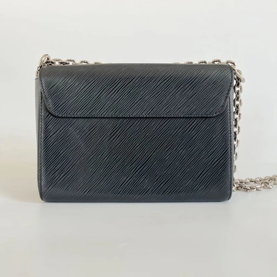 Pre-owned Louis Vuitton Black Epi Leather Twist Mm Shoulder Bag In Default Title