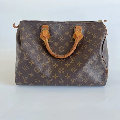 Should You Buy Louis Vuitton Bags Second Hand? - BOPF