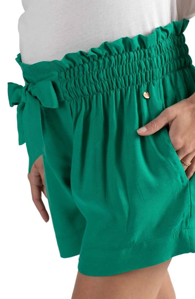 Shop Cache Coeur Nubie Smocked Twill Maternity Shorts In Green