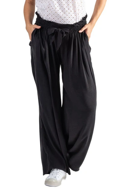 Shop Cache Coeur Sahel Smocked Twill Maternity Pants In Black