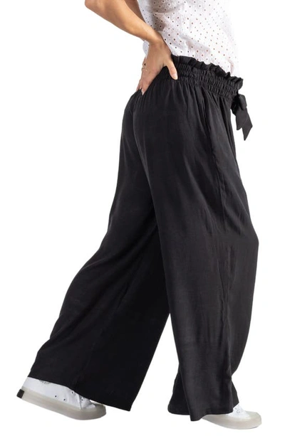 Shop Cache Coeur Sahel Smocked Twill Maternity Pants In Black