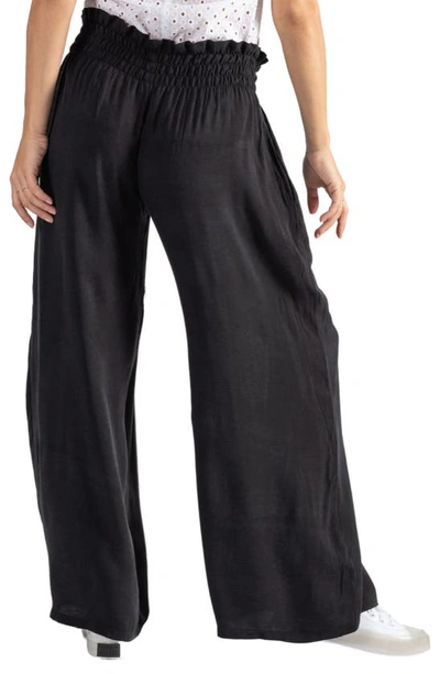 Shop Cache Coeur Sahel Smocked Twill Maternity Pants In Black