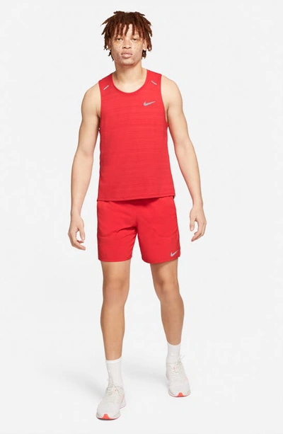 Shop Nike Flex Stride Performance Athletic Shorts In University Red/ University Red