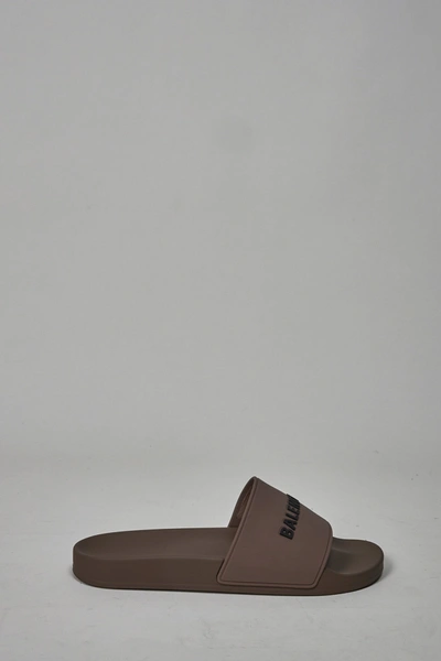 beige balenciaga pool slides