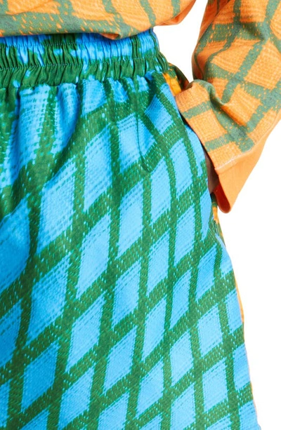 Shop Bianca Saunders Wosh Warped Grid Drawstring Shorts In Blue/ Orange /green Grid Print
