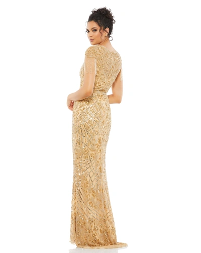 Shop Mac Duggal Embellished Fringe Cap Sleeve Trumpet Gown In Light Gold