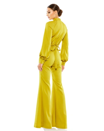 Shop Ieena For Mac Duggal Satin Raglan Long Sleeve High Neck Jumpsuit In Chartreuse