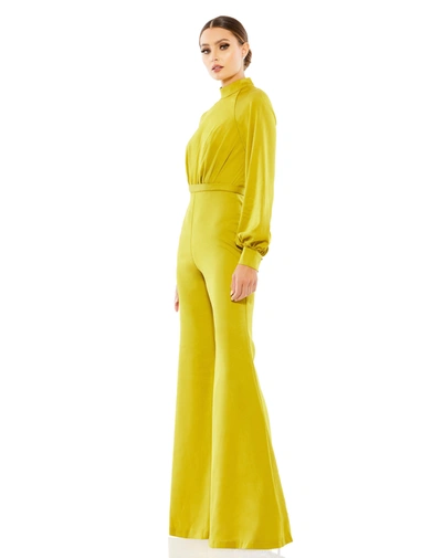 Shop Ieena For Mac Duggal Satin Raglan Long Sleeve High Neck Jumpsuit In Chartreuse