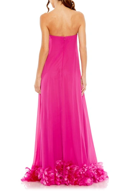 Shop Mac Duggal Strapless Feather Hem High Low Gown In Fuchsia