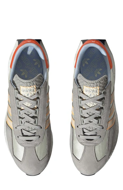 Shop Adidas Originals Retropy E5 Sneaker In White/ Orange/ Blue