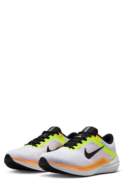 Shop Nike Air Winflo 10 Running Shoe In White/ Volt/ Orange
