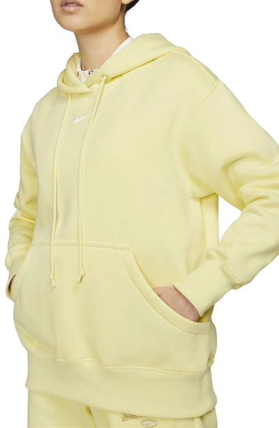 Shop Nike Sportswear Phoenix Oversize Fleece Hoodie In Lemon Chiffon/ Sail