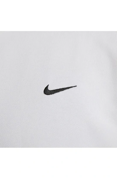 Shop Nike Dri-fit Standard Issue Graphic T-shirt In White/ Black