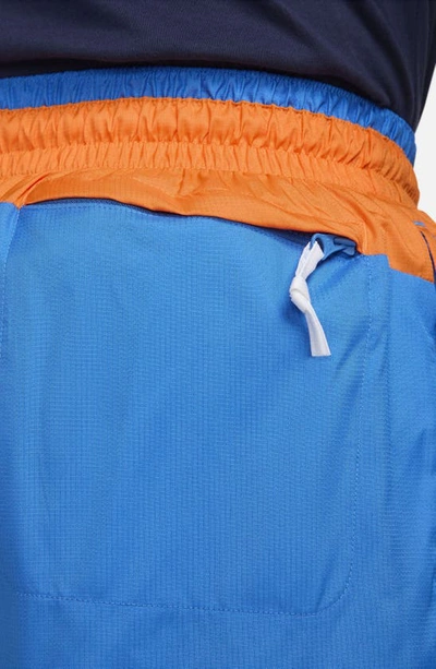 Shop Nike Dna Tie Waist Shorts In Bright Mandarin/ Photo Blue