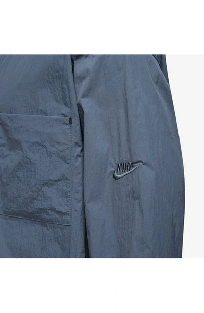 Shop Nike Sportswear Snap Up Performance Shirt In Diffused Blue/ Black