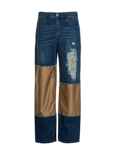 Shop Jw Anderson 'distressed' Jeans In Blue