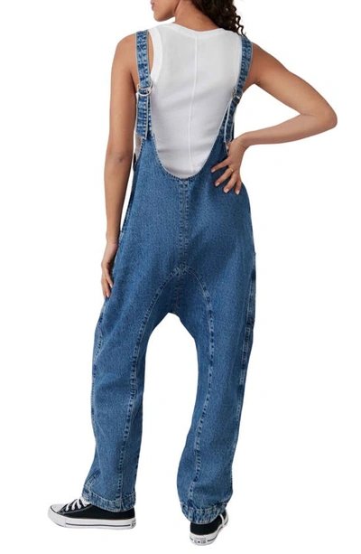Free People High Roller Denim Jumpsuit In Sapphire Blue