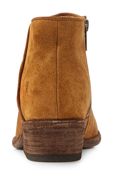 Shop Frye Carson Piping Bootie In Bronze - Suede Leather
