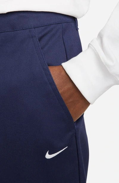 Shop Nike Life Stretch Cotton Chino Pants In Midnight Navy/ White