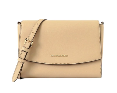 Shop Michael Kors Ellis Flap Messenger In Beige