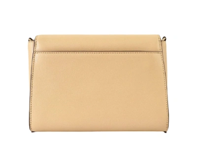 Shop Michael Kors Ellis Flap Messenger In Beige