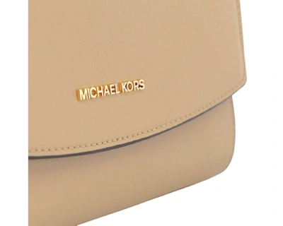 Shop Michael Kors Ellis Flap Messenger In Beige