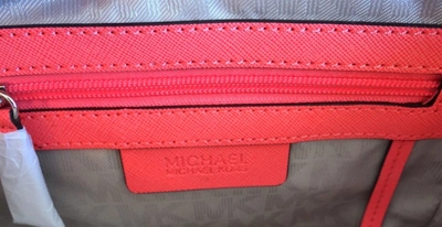 Shop Michael Kors Selma Pocket Messenger In Pink