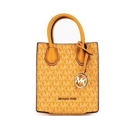 Shop Michael Kors Mercer Xs Honeycomb Signature Pvc North South Shopper Crossbody Women's Bag In Orange