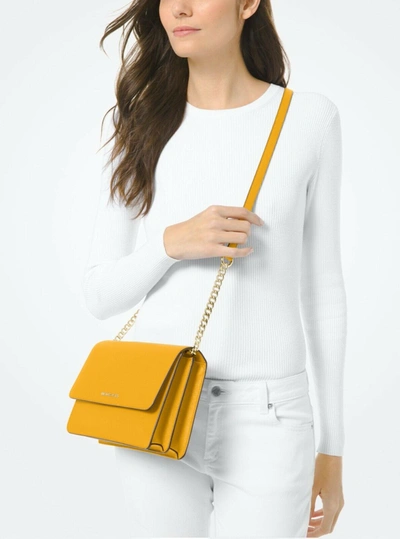 Shop Michael Kors Daniela Gusset Crossbody Leather Bag In Yellow