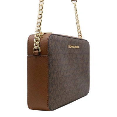 Shop Michael Kors Jet Set Item East West Crossbody Bag In Brown