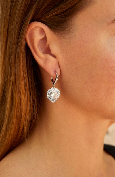 Savvy Cie Jewels Rhod. Plated White Cz Dangle Heart Earrings In Silver