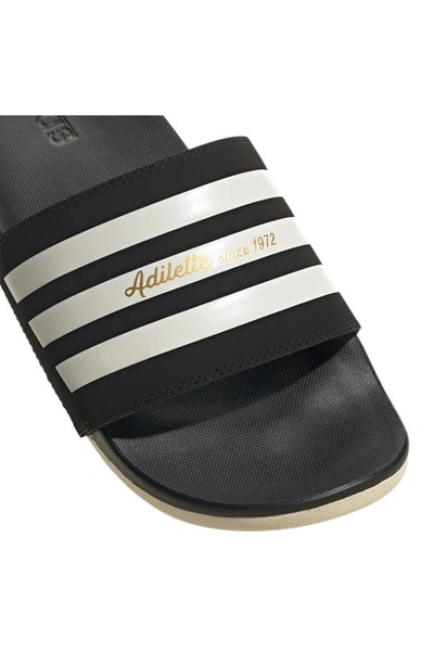Shop Adidas Originals Gender Inclusive Adilette Comfort Sport Slide Sandal In Black/ White/ Gold