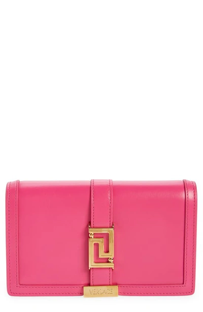 Shop Versace Greca Goddess Leather Clutch In Glossy Pink- Gold