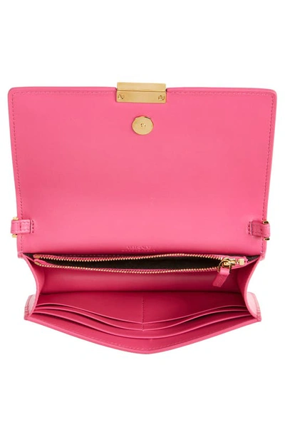 Shop Versace Greca Goddess Leather Clutch In Glossy Pink- Gold