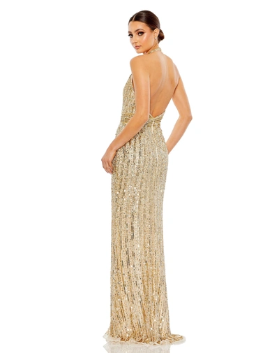 Mac Duggal Sequined Halter Strap Trumpet Gown In Gold Nude