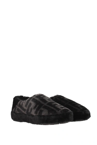 Shop Fendi Slippers Sheepskin Black