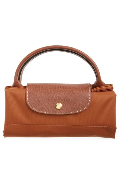 Longchamp Foldable Rectangular Travel Bag Top Handles In Cognac