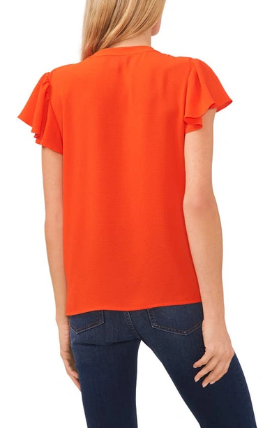 Cece Flutter Sleeve Split Neck Top In Poppy Red