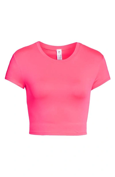 Shop Alo Yoga Adapt Alosoft Short Sleeve Crop Top In Fluorescent Pink Coral