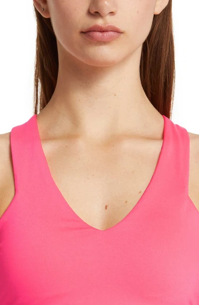 Shop Alo Yoga Real Sports Bra In Fluorescent Pink Coral