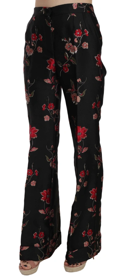 Shop Dolce & Gabbana Elegant Floral Print Boot Cut Women's Trousers In Black